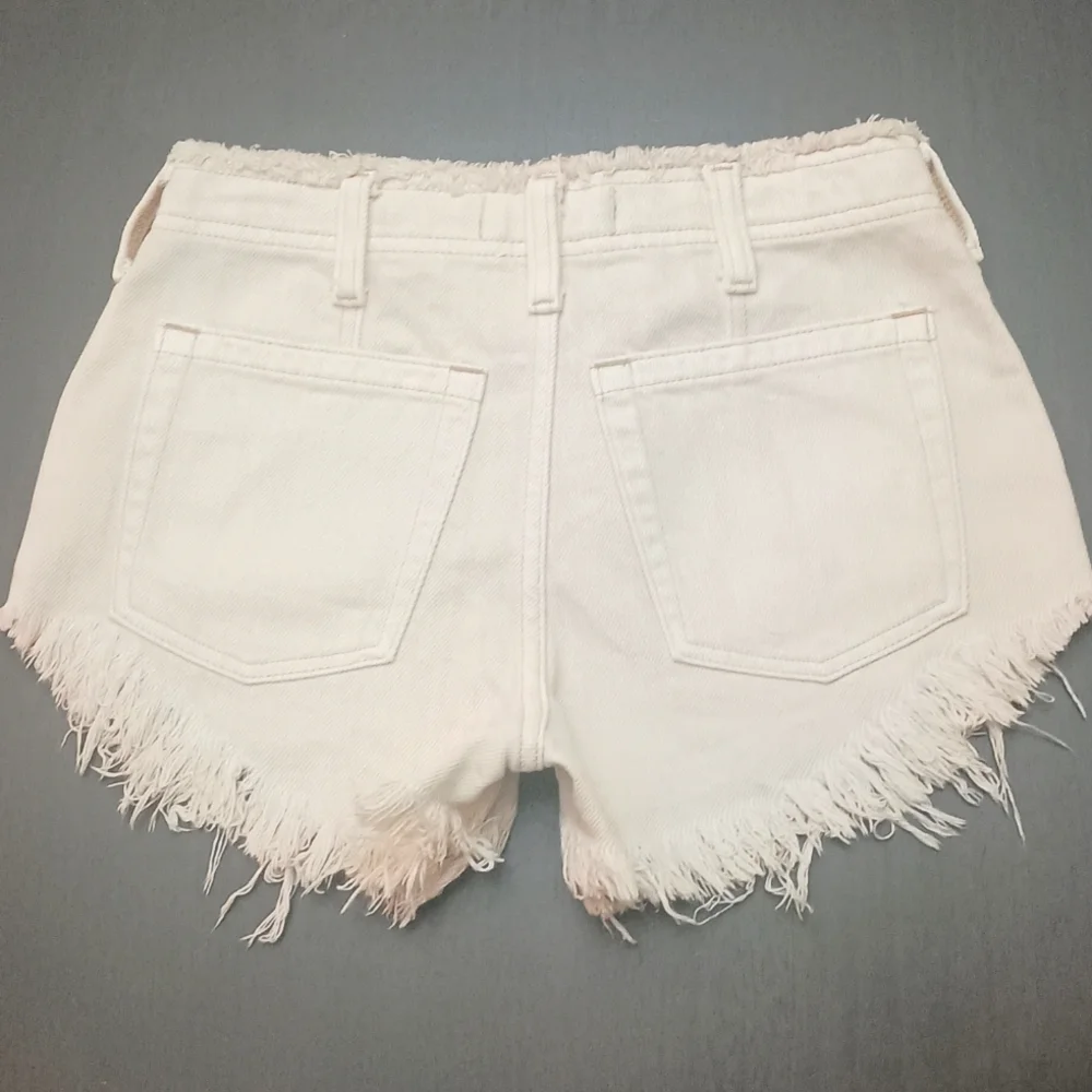 Free People Oversized Becket Lace-Up CutOff Denim Shorts in Salty